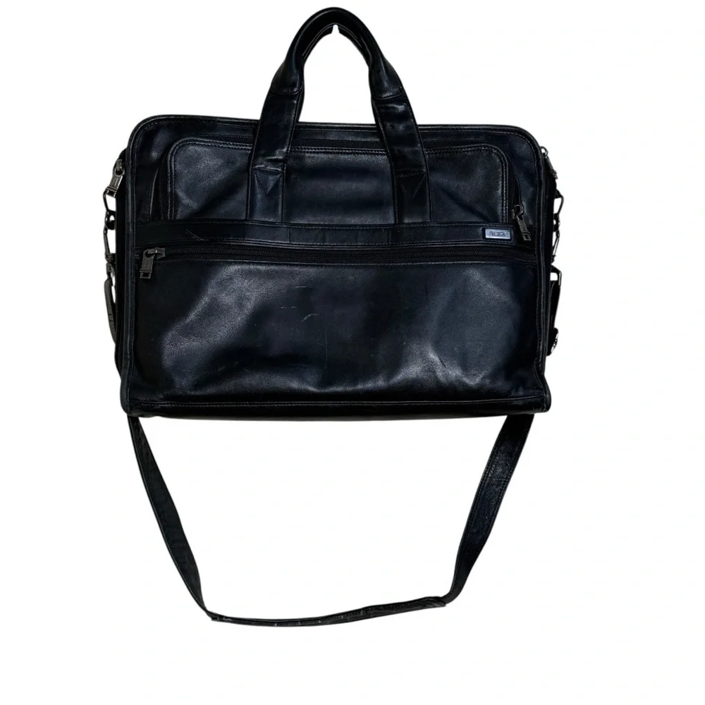 Tumi black leather